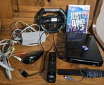 Nintendo Wii Black Console Bundle Oem Remote Nunchuck Sdhc Card Wheel Just Dance. Fixed Price $85.00.