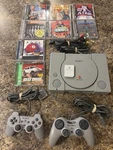 Sony Playstation SCPH-7001 Console System PS1 With 8 Games, 2 Controllers. Fixed Price $95.00.