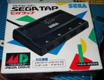 Sega Tap (1994) Brand New Factory Boxed Japan Import. Fixed Price $59.98.