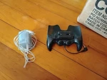 Game Boy Advance Battery Pack Back Attachment Plug Thing With Cord. Fixed Price $50.00.