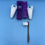 Nyko Wii Nunchuck Remote Sleeve Receiver Dongle Adapter. Fixed Price $30.99.
