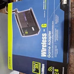 Linksys WGA54G Wireless-g Game Adapter Black Ethernet Port 2.4-GHZ Compact Nib. Fixed Price $46.54.