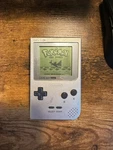 Nintendo Game Boy Pocket Silver Handheld System. Fixed Price $50.00.