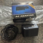 Adaptor Official (sega Genesis) Original Replacement Part Oem - Comes Box. Fixed Price $35.00.