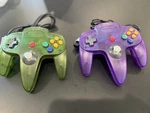 Zerostory N64 Wired Controllers Transparent Green Purple Ergonomic Nintendo. Fixed Price $75.00.