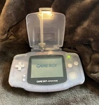Nintendo Game Boy Advance Gba Glacier AGB-001 W/ Light. Fixed Price $99.00.
