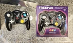 Lot Of (2) Cirka "freepad" Wireless Controllers For Gamecube (black). Fixed Price $37.05.
