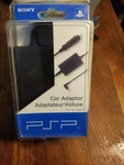 Sony Psp -180U/98528 Wired Black Adjustable Plug Fits Car Adaptor Factory Sealed. Fixed Price $30.00.