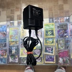 Sega Genesis Power Adapter MK-2103. Fixed Price $18.00.