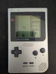 Nintendo Game Boy Pocket Silver Handheld System. Fixed Price $49.99.