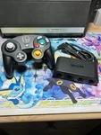 Nintendo Super Smash Bros Gamecube Controller W/ Wii Adapter. Fixed Price $89.99.