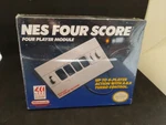 Brand New Nintendo Four Score 4-PLAYER Controller Adapter NES-034 Sealed. Fixed Price $120.00.