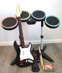 Rock 4 Xbox One Band-in-a-box Bundle Complete With Controllers Game. Fixed Price $650.00.
