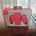 Nintendo Switch Joy-con Comfort Grip Red New Power A. Fixed Price $30.00.