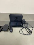 Nintendo Switch With Gray Joy-con. Fixed Price $239.99.