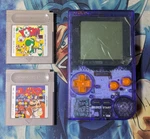 Nintendo Gameboy Pocket Console + Dr. Mario & Yoshi Cartridges Nyko Worm Light. Fixed Price $96.00.