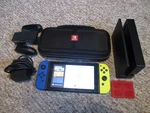Nintendo Switch System 32GB Console W/neon Yellow & Blue Joy-cons +case Extras. Fixed Price $169.95.