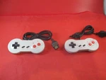 Set Of 2 Nintendo Nes Tomee Dogbone Controller Paddle Gamepad Remote *brand New*. Fixed Price $18.99.