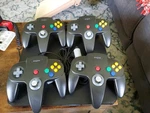 New - (4) Saffun Oem N64 Replacement Controllers For Video Game Console. Fixed Price $48.00.