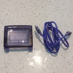 Mad Catz Game Boy Color Atomic Purple Magnifier Light W/ Link Cable. Fixed Price $20.00.
