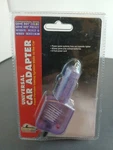 Pelican Universal Car Adapter Purple - New & Sealed. Fixed Price $14.99.