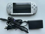 Sony Psp 2000 Console Ice Silver Good Condition + 4GB Card Charger- Tested. Fixed Price $129.95.