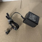 Atari Class 2 Power Supply Model KU35-9-300D 9V Dc 300MA. Fixed Price $10.00.