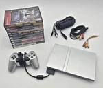 Sony Playstation PS2 Slim Bundle, 11 Games, Console, Controller, Cords. Fixed Price $218.49.