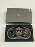 8BITDO NES30PRO Bluetooth Gaming Controller For Ios Android Pc. Fixed Price $49.00.