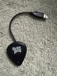 Guitar Hero PS3 Paul Wireless Receiver Dongle Red Octane Model 95121.806. Fixed Price $37.49.