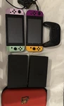 Nintendo Switch Console Lot With Pro Controller And Case. Fixed Price $320.00.