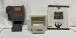 Game Genie Nintendo Boy W/ Manual Code Book Galoob 7359 & Tiger Magnifier. Fixed Price $49.99.