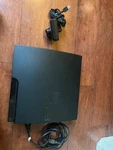 Sony Playstation 3 - Slim Console With Camera And Motion Sensing Controller. Fixed Price $119.00.