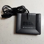 Sega Enterprises MK-80102 Black Wired 6-PLAYER Multi-tap Adapter For Saturn. Fixed Price $79.99.