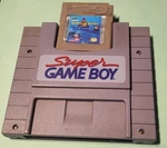 Super Nintendo Cartridge Adapter SNS-027 W/ Sea Quest. Fixed Price $49.00.