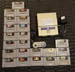 Super Nintendo SNS-001 With Oem Controller Plus 22 Games. All Tested And Working. Fixed Price $380.00.