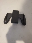 Nintendo Switch Joy-con Charging Grip. Fixed Price $20.00.