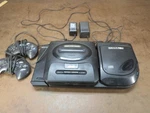 Sega Cd MK-4102A Console With Genesis Untested. Fixed Price $225.00.