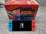 Nintendo Switch Oled Handheld Console 64GB Model: HEG-001 With B/r Joycon. Fixed Price $189.99.