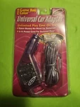 New Sealed Intec Universal Car Adapter For Game Boy Color 2001. Fixed Price $14.00.