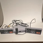 Nintendo Nes Console System W/ 2 Wired Controllers Gray/black. Fixed Price $60.00.
