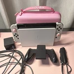 Nintendo Switch Console Dock Joy-con Charger Grip Strap Multiplayer. Fixed Price $200.00.