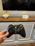 Microsoft Xbox 360 Wireless Gaming Controller - Black (model 1403). Fixed Price $40.00.