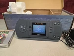 Atari Lynx Handheld Video Game Console With Box & Ac Adapter. Fixed Price $260.00.